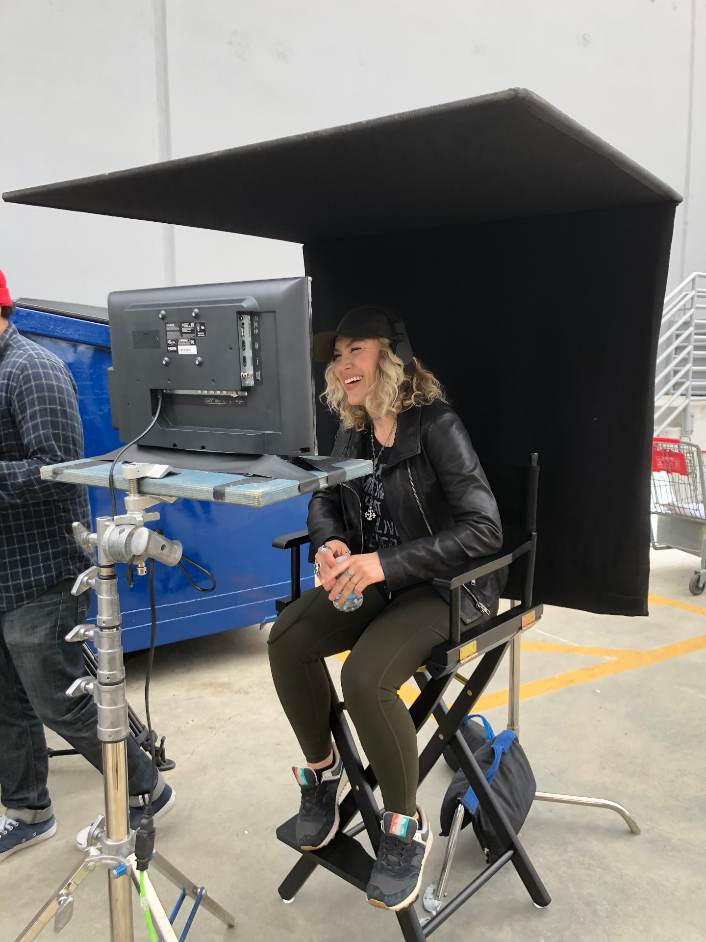 Rodes Phire laughing in the director's chair